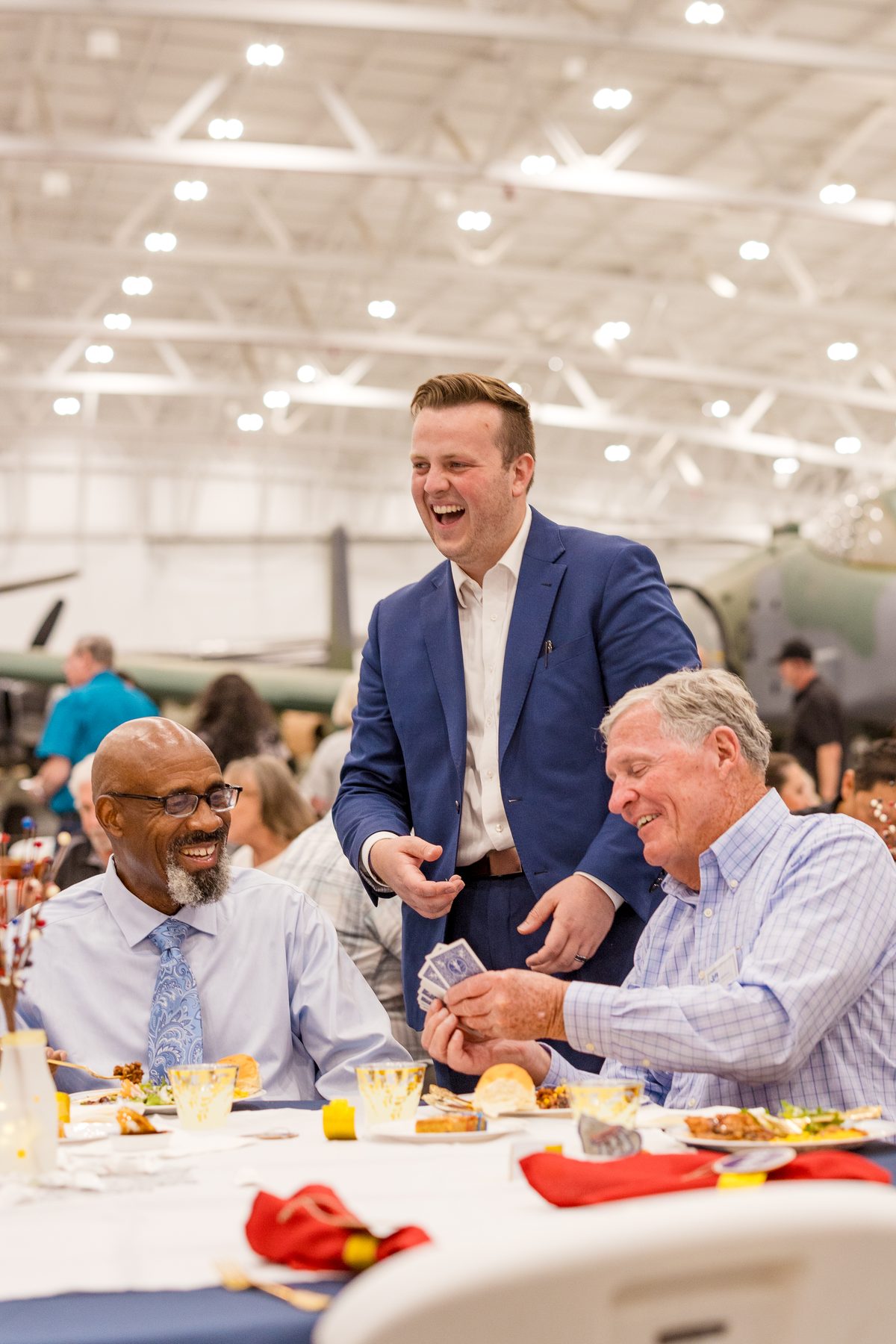 Two guests laughing during Tyler August close-up magic