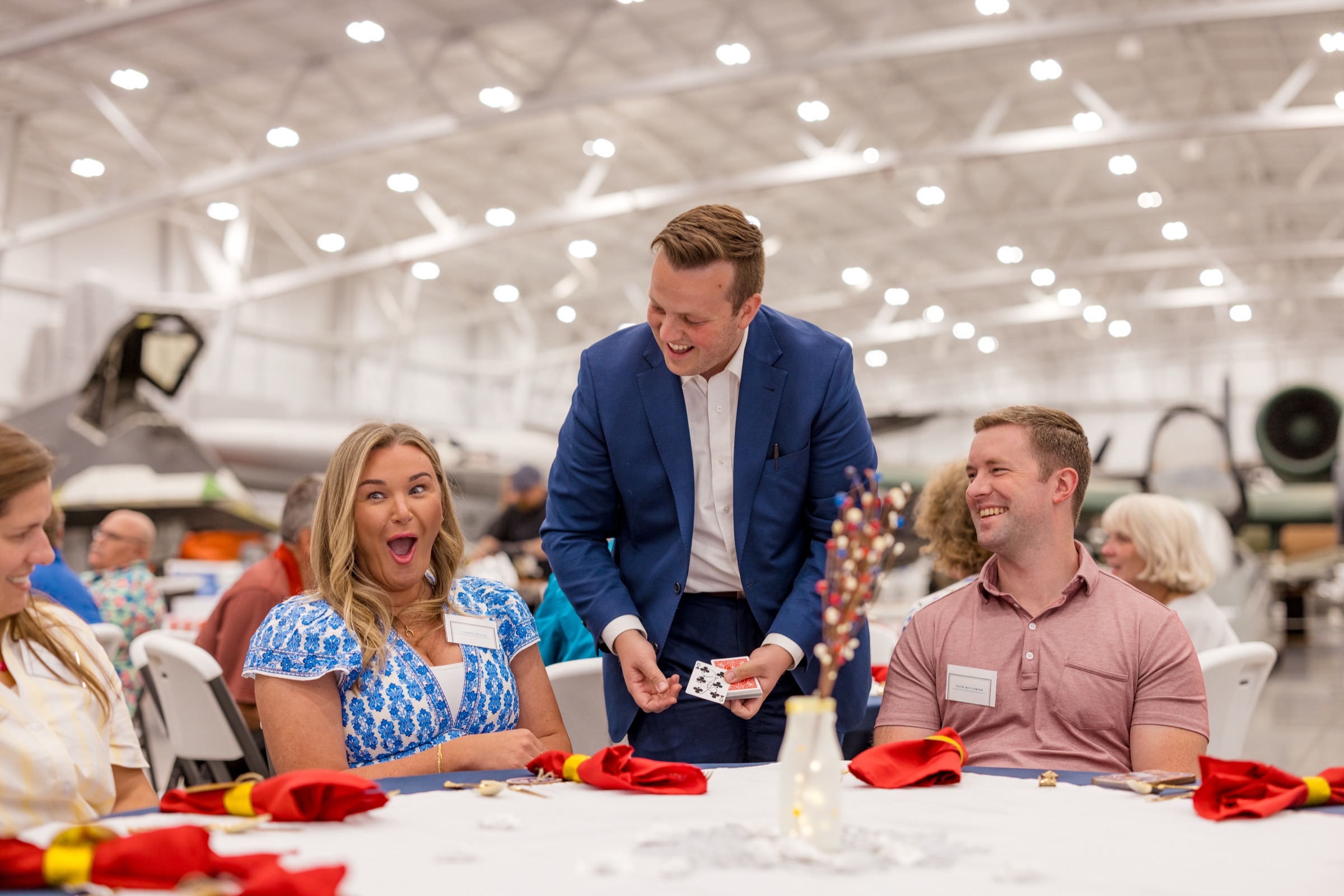 Tyler August performing for a corporate audience
